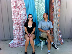 Alyssa and Marcel, from the lighting company, make sure the photo booth is ready for guests.