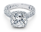 Love milligrain work and pave diamonds? The setting of Tacori's platinum engagement ring features both in a bold, cushion-shaped setting.