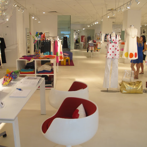 The chairs look almost like eggs with the tops cut off. I think the shape and use of color is so great.