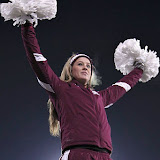 Cheering under the lights.