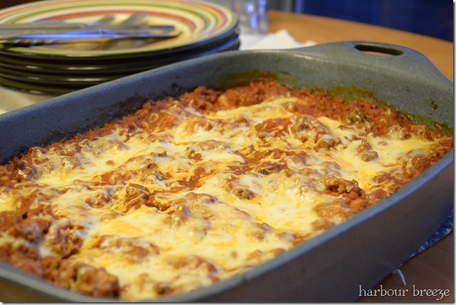 Make ahead lasagna cooked and sitting on a table in a 9 x 13 inch casserole dish