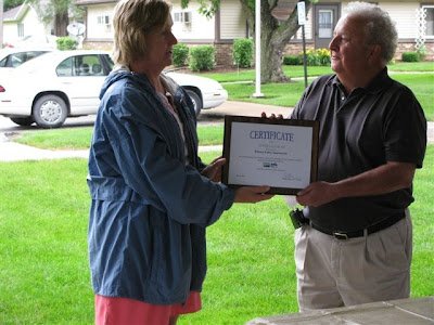 Kim Regennitter (USDA Rural Development) and Phil Ropp (Kalona Valley Apartments board president)<br />
Photo Courtesy of USDA