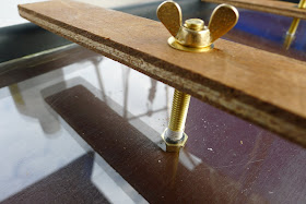 Detail of backing plate mounting