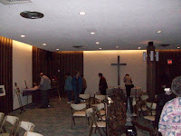 Visitors looking at artifacts in the chapel at the Jones-Eden Funeral Home.