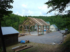The frame assembly nears completion.  Only the interior posts and second floor system are missing in this photo.