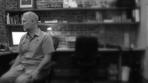 Shawn Askinosie, attorney-turned-chocolatier, manages the international operation from his office on Commercial Street in Springfield. (Photo credit: Kenrick Nobles)