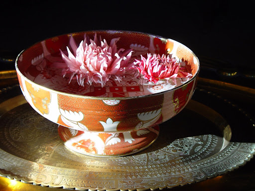 Dahlia's floating in an export porcelain bowl.