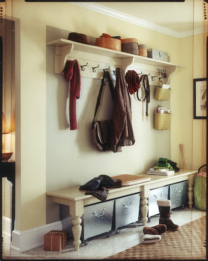 The entry is one of the areas that can get out of control quickly. These rolling bins tucked under a bench keep belongings looking neat. The entry is one of the areas that can get out of control quickly. These rolling bins tucked under a bench keep belongings looking neat.