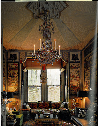 Here's another room with a dramatic tented ceiling and an exquisite antique chandelier.
