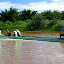 One Of Our Group's Canoes Headed Downstream - Suva, Fiji