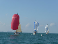 Sheldon Clarke Regatta 2010 / Sheldon Clarke 2010: The skies clear as boats finish the second race on Saturday.  Here the final three:  Collaboration, Rhumb Runner, and La Tempete.
