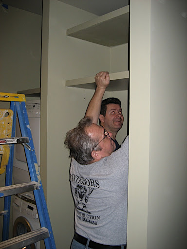 The crew from BC Interiors began the process of reconfiguring the laundry closet. It took a day to take everything out.