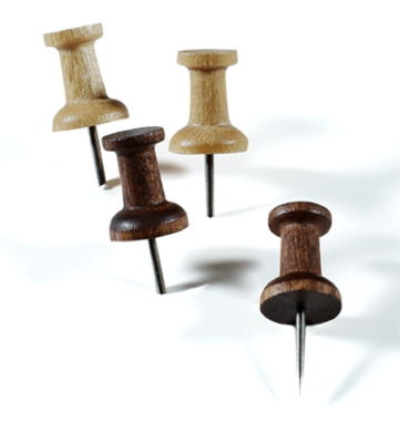 I like these wood pushpins. They're a chic option for tacking up pictures on the cork board. (containerstore.com) I like these wood pushpins. They're a chic option for tacking up pictures on the cork board. (containerstore.com)