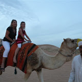 Mia and I camel riding in the desert