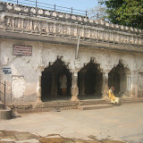 There are images, of very low craftsmanship, just below the roof on a horizontal frieze.