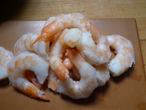 Large, peeled and deveined shrimp is gently cooked.