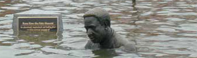 An Annapolis statue commemorating 'Roots' author Alex Haley is inundated during Hurricane Isabel in 2003. Photo: UCS
