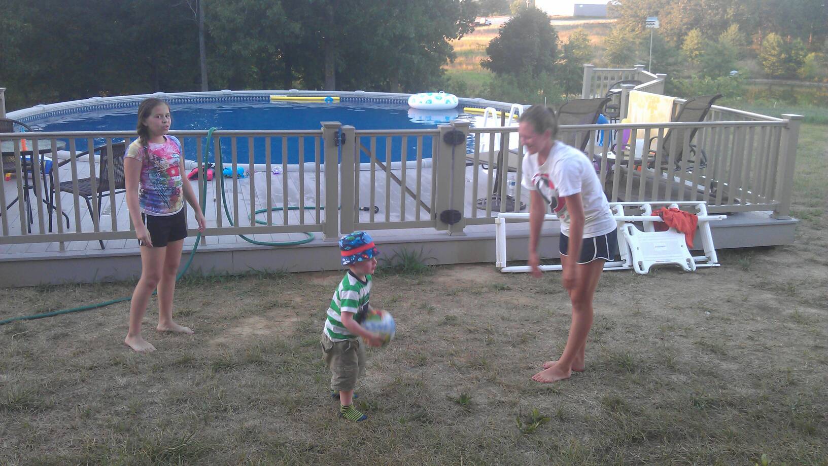 Chelsea and Brooke and Andy playing ball