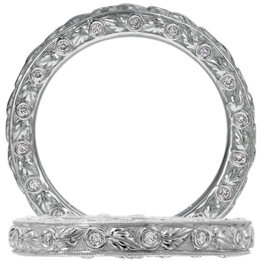 For an Old World style, this Ritani Romantique eternity band features bezel-set diamonds and hand-carved leaves. For an Old World style, this Ritani Romantique eternity band features bezel-set diamonds and hand-carved leaves.