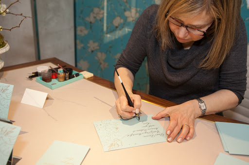 Calligrapher Deborah Nadel writing love notes for our guests on Tiffany stationery. She was intregal to our surprise proposal later in the night! Calligrapher Deborah Nadel writing love notes for our guests on Tiffany stationery. She was intregal to our surprise proposal later in the night!