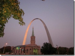 arch and church at dusk