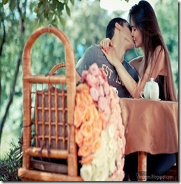 Kissing-couple-on-table-hug-love-teen-age-cute-young