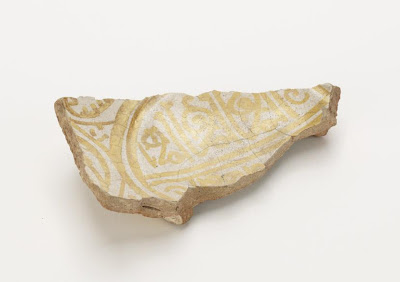 Bowl (fragment) | Origin:  Egypt | Period: 11th century  Fatimid period | Details:  Not Available | Type: Earthenware painted in lustre on an opaque white glaze | Size: H: 11.6  W: 6.7  cm | Museum Code: F1908.209 | Photograph and description taken from Freer and the Sackler (Smithsonian) Museums.