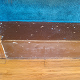 Pulling off the carpet.... Thinking I could leave the bare wood stairs.