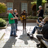 A band of musicians play selections of Irish music to entertain the public at St Luke's, The Bluecoat Courtyard and in Liverpool One Tunin' up the Town