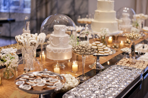 I love putting the desserts on different size trays and cake stands to add depth to the table.