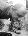 Real men kiss kitties!