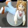 Bonequinha de biscuit deitada Bonequinha de biscuit deitada