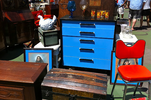 What a great color for the dresser! Only at a flea market can you find a piece like that.