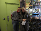 Marc and Martha are old friends and posed for a photo.   Martha is carrying a special sandwich that she bought at a little place called, Happy Hostess, next door to the pet store.