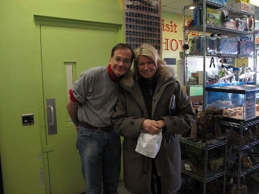Marc and Martha are old friends and posed for a photo.   Martha is carrying a special sandwich that she bought at a little place called, Happy Hostess, next door to the pet store.