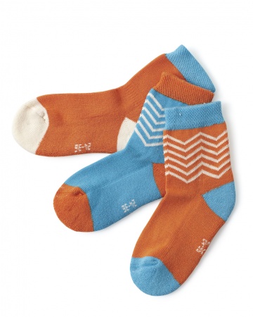 These infant socks are purposely mismatched; the seamless design means they won't dig in, but they will stay put.