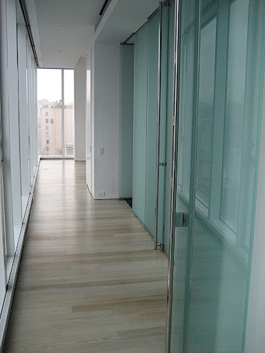 The hallway leading to the master bedroom.  It contains two walk in closets, the master bathroom and a reach in closet.