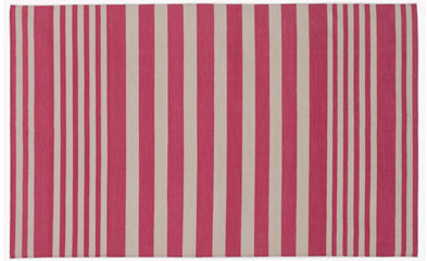 A rug with bright stripes can enliven a space.
(madelinewinerib.com) A rug with bright stripes can enliven a space.
(madelinewinerib.com)