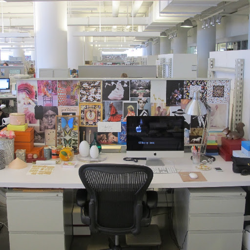 Welcome to my desk. As you can tell right away, I am most inspired by color and photography.