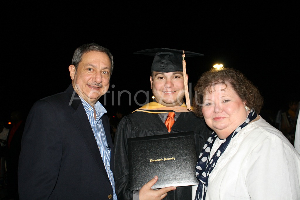 [Grad-and-parents4.jpg]
