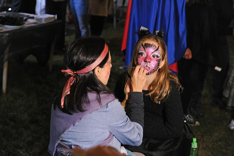 Anna painted more faces. Aren't the colors wonderful? Photo: David M. Russell
