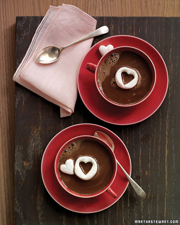 Adorable cut-out marshmallow hearts floating on rich hot chocolate. (marthastewart.com)