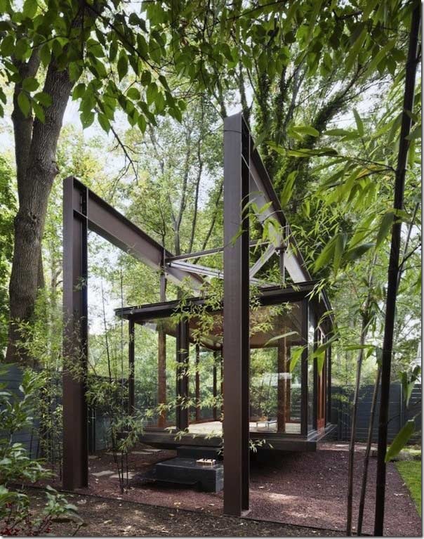 natural glass house in the forest