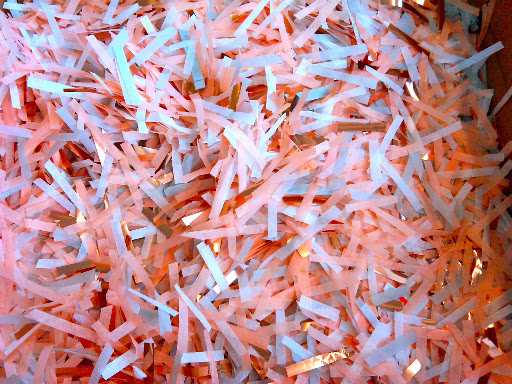Here, blue, pink, and gold confetti to throw at the new bride and groom.