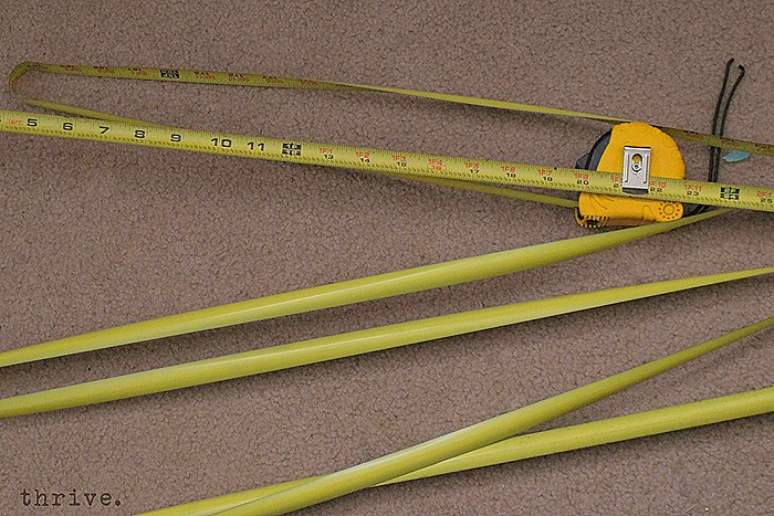 Use a busted tape measure to decorate shelves - choosetothrive.blogspot.com