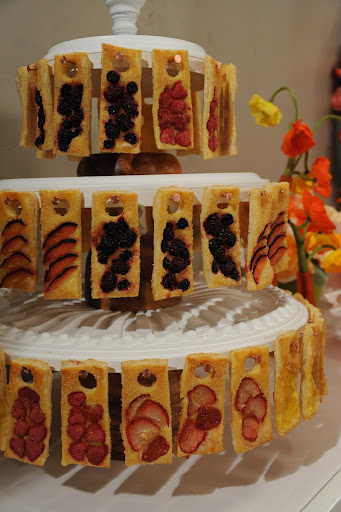 Pinch Food Design (http://pinchfooddesign.com) created this lovely (and addictive) tartlet tier.