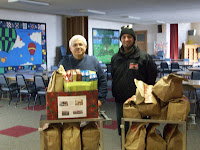 KCII's General Manager delivering food at the Asbury United Methodist Church in Wellman
