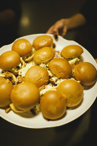 Pork sliders were passed upon guests' arrival, as were empanadas. For dinner, tacos, carne asada, and rice and beans were served out of taco carts, creating a more casual environment. Pork sliders were passed upon guests' arrival, as were empanadas. For dinner, tacos, carne asada, and rice and beans were served out of taco carts, creating a more casual environment.