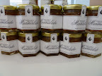 Annie's sister-in-law, Alison, made bergamot-orange marmalade for one of the favors. It was packaged in hexagonal jars and finished with labels.