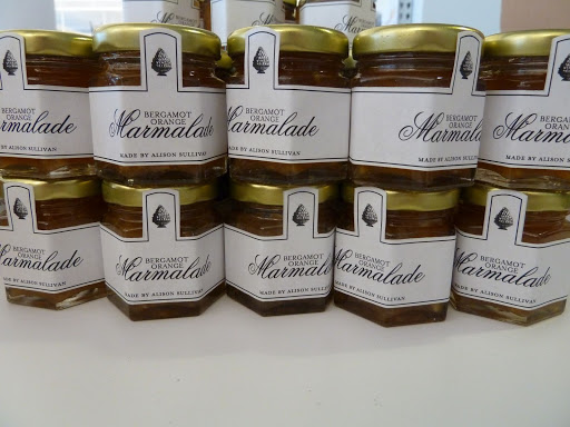 Annie's sister-in-law, Alison, made bergamot-orange marmalade for one of the favors. It was packaged in hexagonal jars and finished with labels.